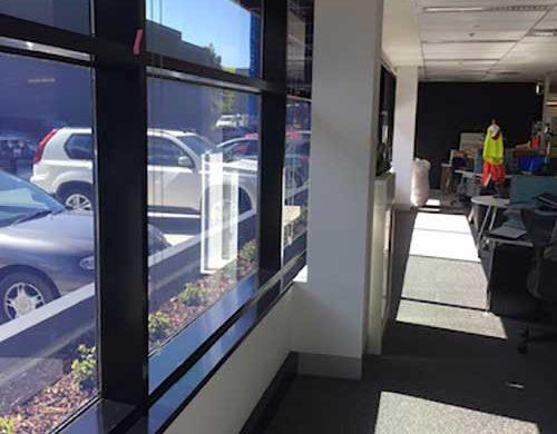 Commercial Window Tinting - Solar Window Film - Solar Gard TrueVue 30 - Insurance Australia Group Mulgrave - TintFX - comparison shade on the carpet - with and without film
